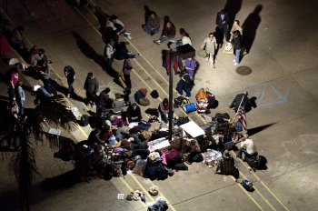 Activists gather before press conference tonight